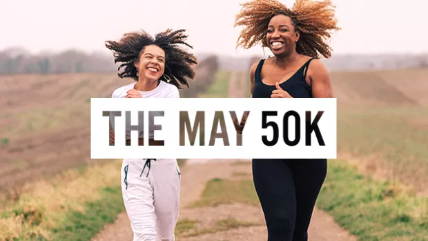 Two women running in the countryside