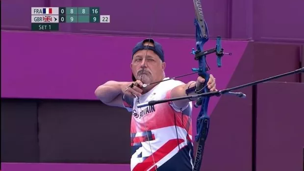 Dave Phillips doing archery at the paralympics 