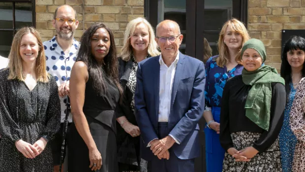 MS Society trustees standing outside on a sunny day