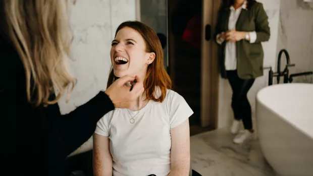 Rose having her make up done on the Hope Reborn set. Photo by Ralu Chase.