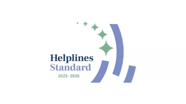 Helplines standard logo - text reads Heplines Standard 2023-2026