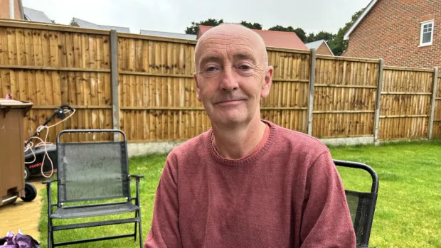 Frank sitting in the garden