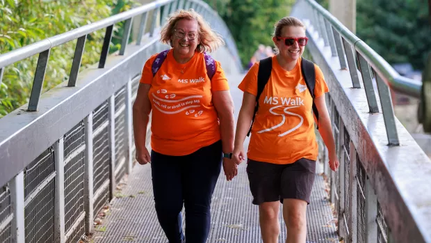 Two women taking part in MS Walk Cardiff