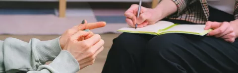 therapist taking notes