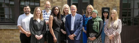 MS Society trustees standing outside on a sunny day